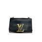 Sac bandoulière Louis Vuitton Louise. Sac bandoulière Louis Vuitton Louise.