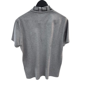 Polo Versace taille S-M, état neuf