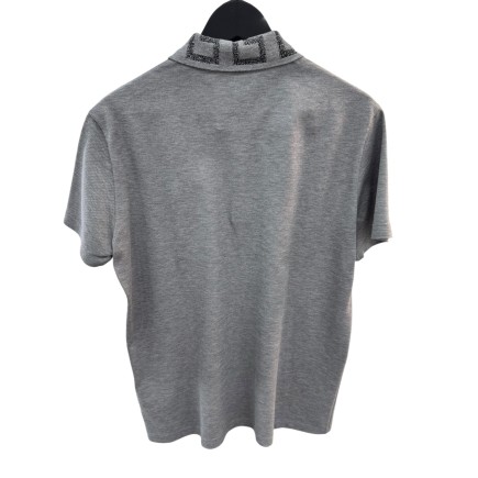 Polo Versace taille S-M, état neuf