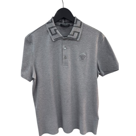 Polo Versace taille S-M, état neuf