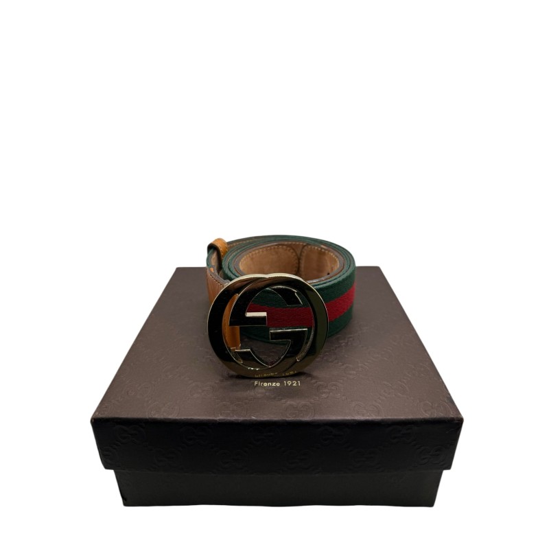 Ceinture Gucci en tissu et cuir T85. Ceinture Gucci en tissu et cuir T85.