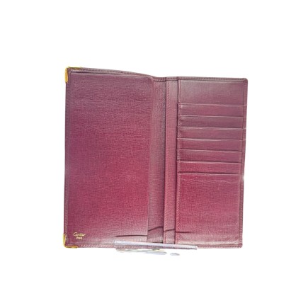 Portefeuille Cartier vintage, en parfait état.