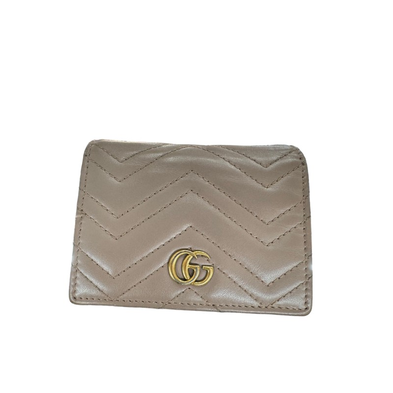Portefeuille Gucci en cuir. Portefeuille Gucci en cuir.