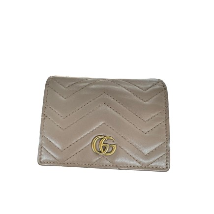 Portefeuille Gucci en cuir.