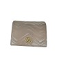 Portefeuille Gucci en cuir. Portefeuille Gucci en cuir.