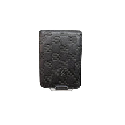 Porte cartes Louis Vuitton en cuir.