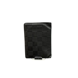 Porte cartes Louis Vuitton en cuir.