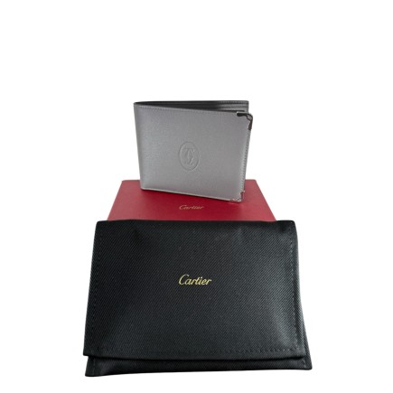 Portefeuille Cartier en cuir, produit neuf.