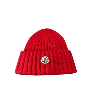 Bonnet Moncler taille M, produit neuf.