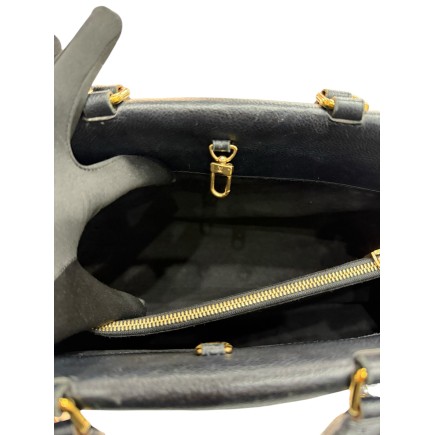 Louis Vuitton Venus, avec bandoulière et cadenas.